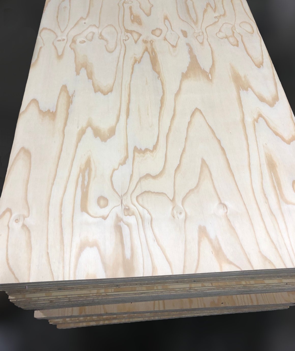 Pine raw plywood panel showing smooth surface and cross-laminated veneer layers